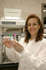 Student with tubes at machine