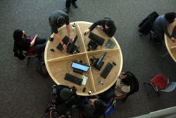 Photo of students at computer workstations