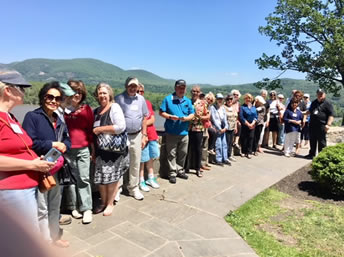 Encore members group overlooking Hudson River from the Point
