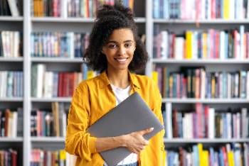 Young woman holding a laptop