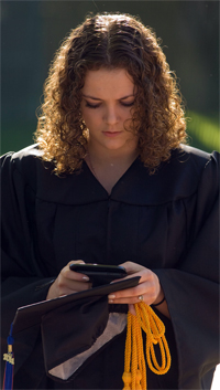 student checking phone