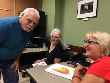 Instructor with students in Color Pencil Drawing class