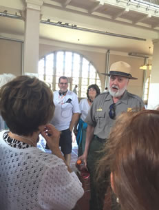 Encore members at Ellis Island's Great Hall