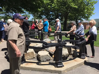 Inspecting the original forged iron chain across Hudson River