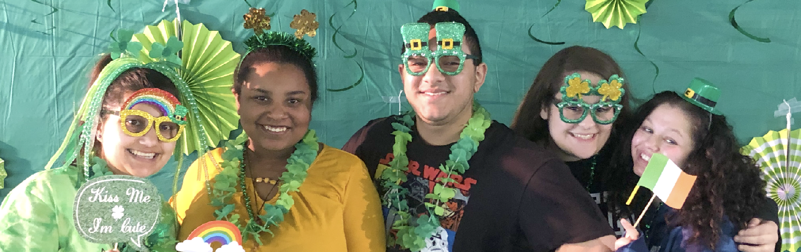 students in luck of irish photo booth