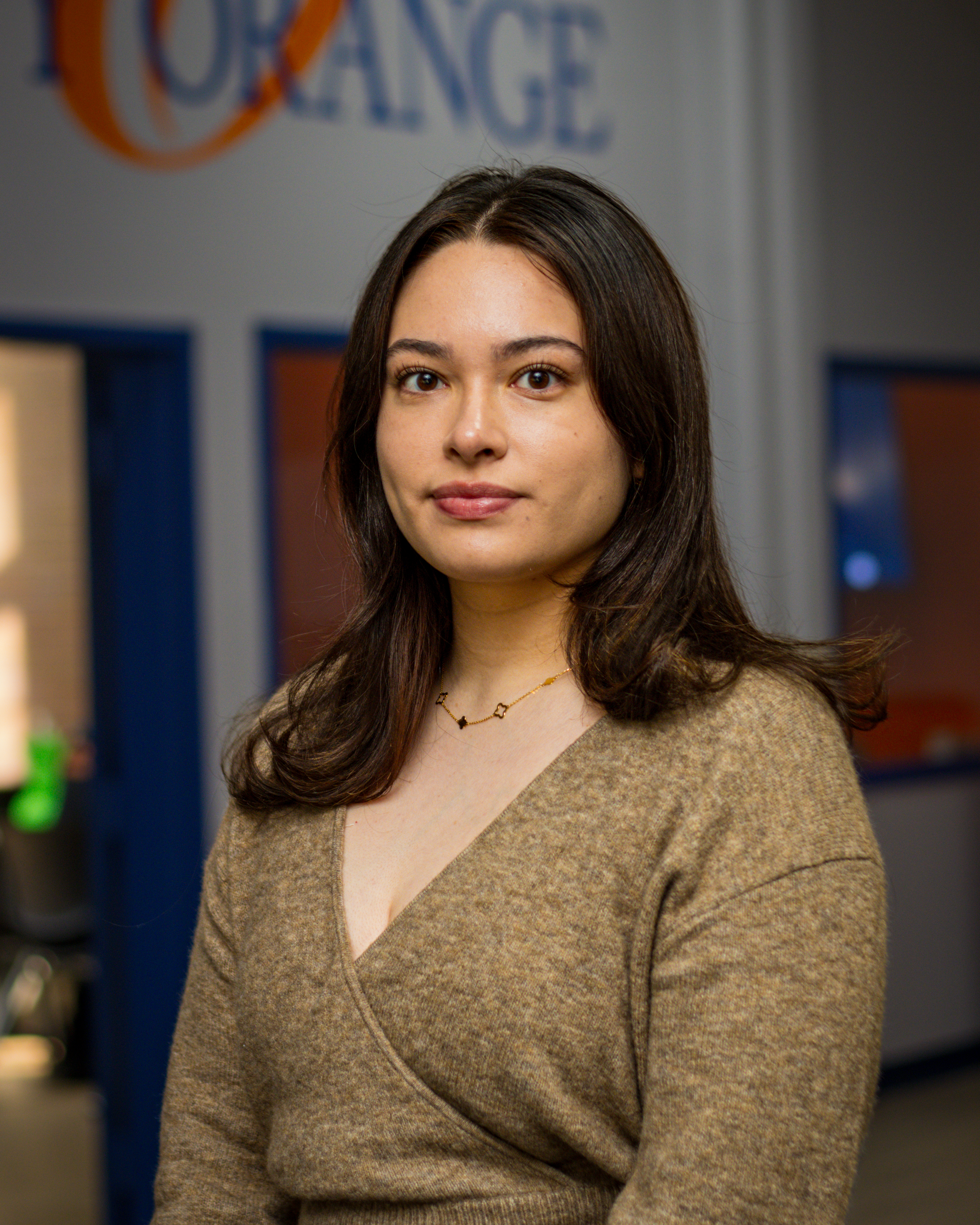 student senator looks into camera for formal photo