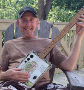 Steve Boyer, with his cigarbox guitar