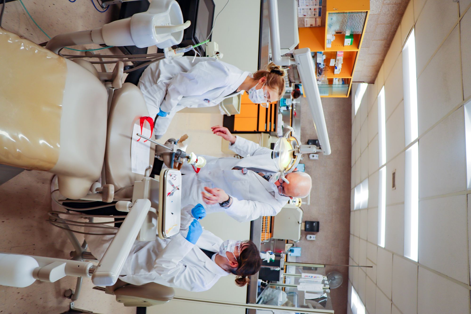 Dental Hygiene professor working with students