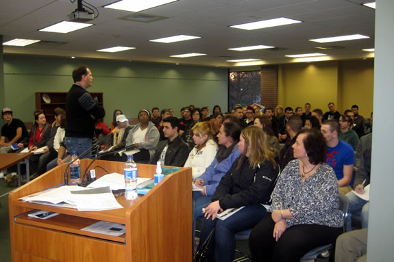 Picture of lecturer among the audience