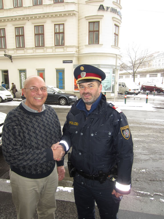 Prof Jurain greets policeman Vienna 2013