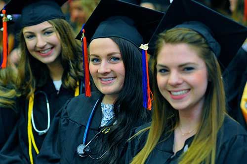 Smiling SUNY Orange Graduates