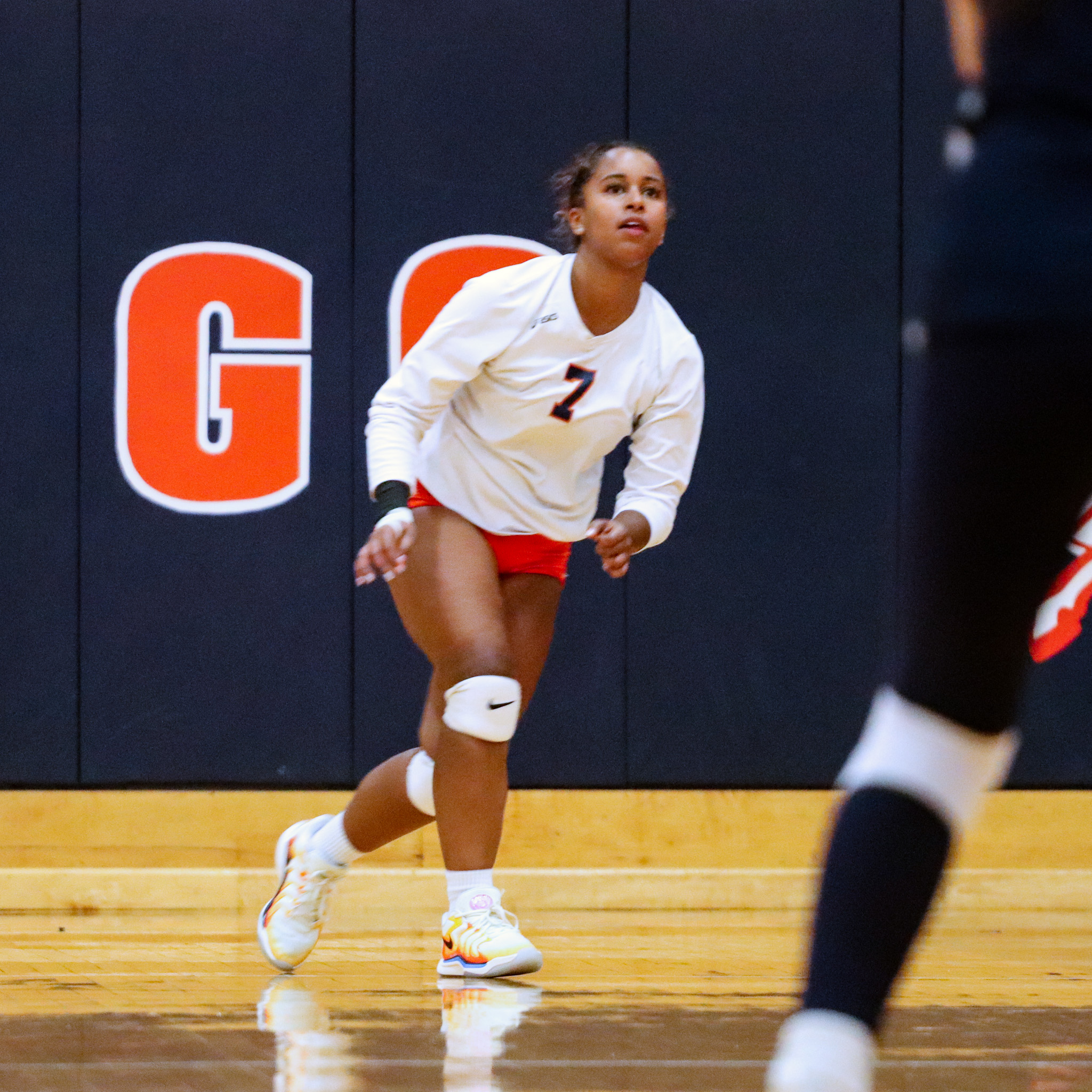 Alivia Torres getting ready to return the ball