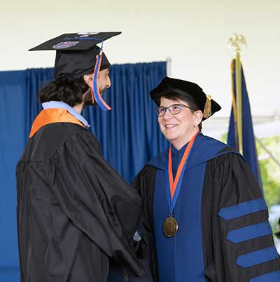graduate handshake