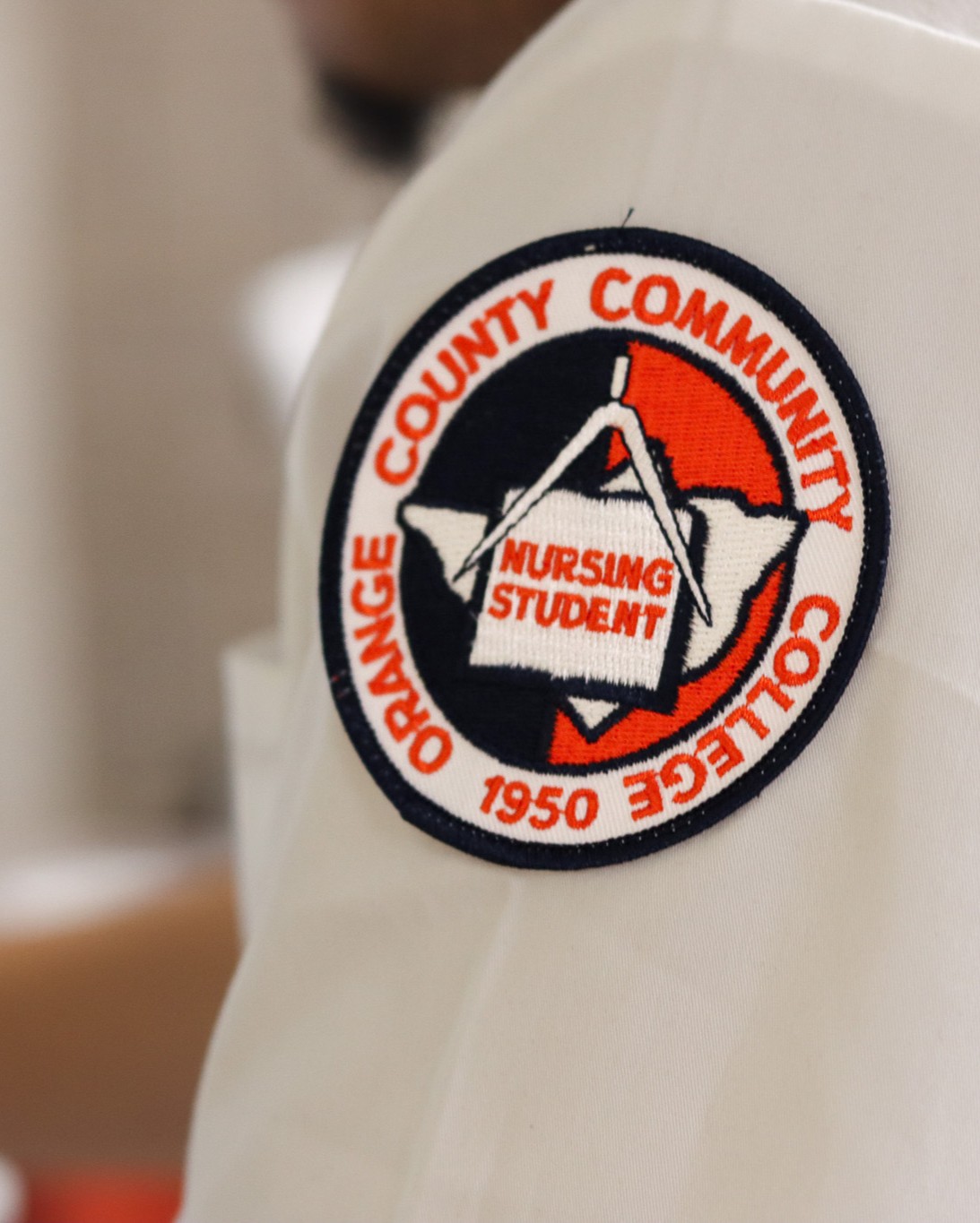 embroidered badge for nursing students on sleeve of student 
