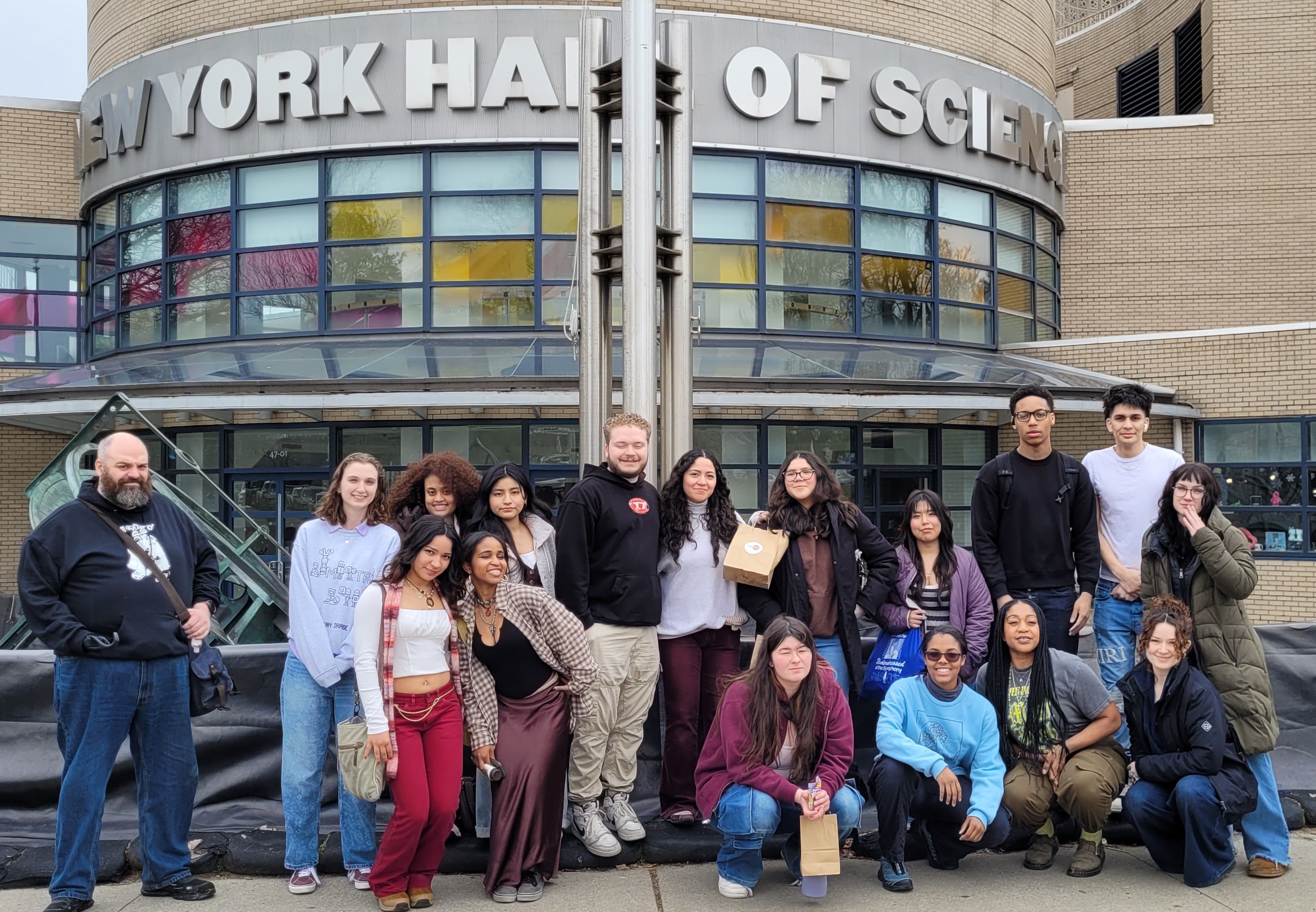 Chemistry Club New York Hall of Science Chemistry Club members posing for a group photo in front of the New York Hall of Science