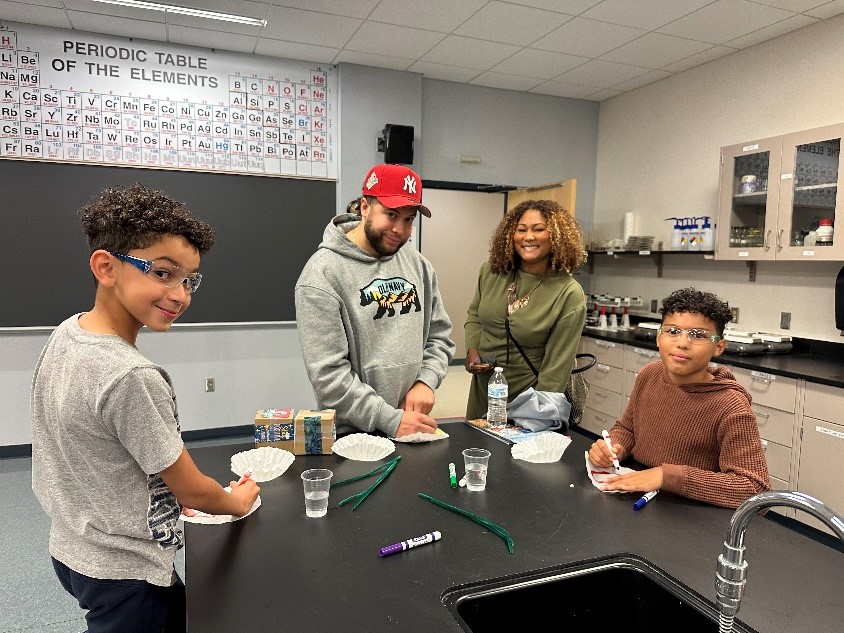 Our very own Flor Araujo (Director of Center for Student Success) and her family making coffee filter chromatography flowers.