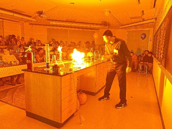 Dr. McCall lighting gun cotton on fire