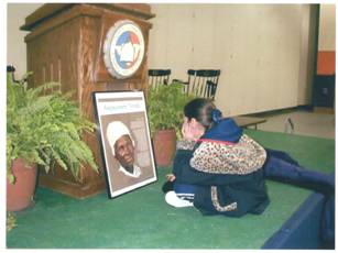 Photo: student looking at portrait of Sojourner Truth
